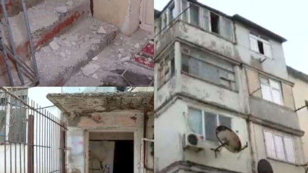 Bakıda beşmərtəbəli binanın daşları tökülür: Təhlükəli vəziyyət yaranıb - Video